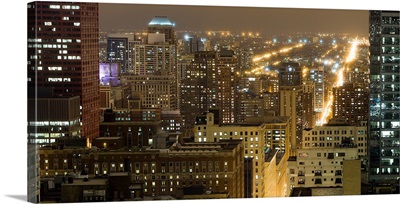 Buildings in a city lit up at night, Chicago South Loop, Chicago, Illinois,