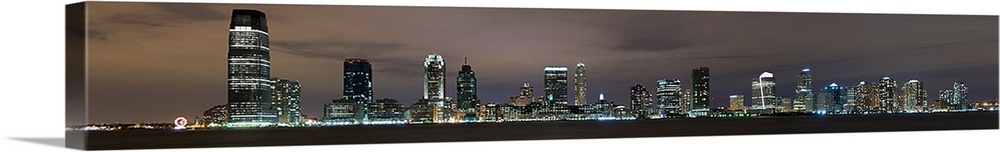 Buildings in a city lit up at night, Hudson River, Jersey City, Hudson County, New Jersey,
