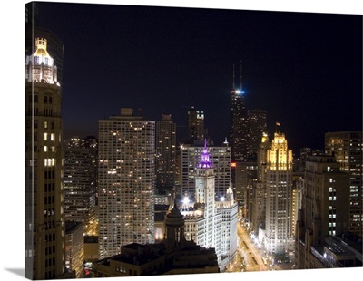 Buildings in a city lit up at night, Magnificent Mile, Upper Michigan Avenue, Michigan Avenue, Chicago, Illinois,