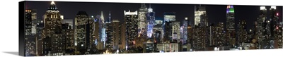Buildings in a city lit up at night, Midtown Manhattan, Manhattan, New York City, New York State,