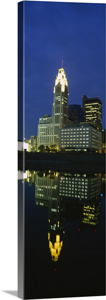 Buildings in a city lit up at night, Scioto River, Columbus, Ohio
