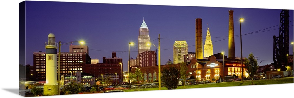 Panoramic image of buildings lit up at night in a downtown Ohio city.