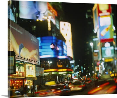 Buildings lit up at night in a city, Times Square, Manhattan, New York City, New York State
