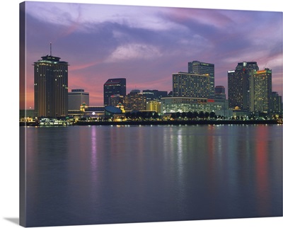 Buildings lit up at sunset, New Orleans, Louisiana