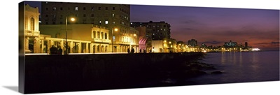 Buildings lit up at the waterfront, Malecon Avenue, Havana, Cuba