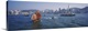image thumbnail of Panoramic print of ships sailing in the ocean with a downtown cityscape in the distance meeting the water.