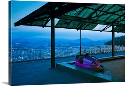 Bumper car at Monte Igueldo amusement park at dusk, San Sebastian, Spain