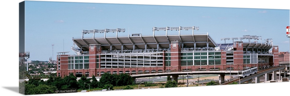 Giant, horizontal photograph taken from a hanging cable car of the outside of M & T Back Stadium in Baltimore, Maryland.