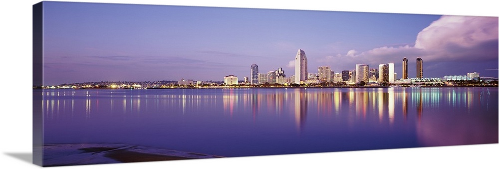 Giant photograph on a landscape wall hanging of the San Diego skyline, including the financial district, with building ref...
