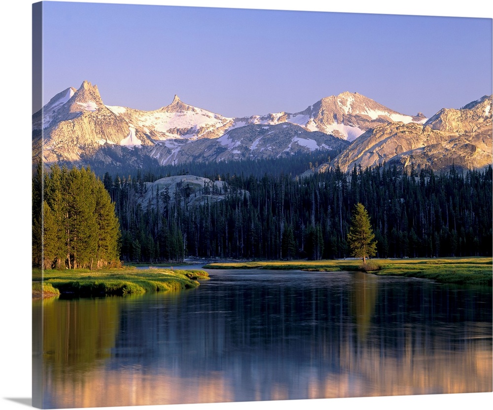 Big art  work for the home or office this is a landscape photograph of mountains and conifer trees reflecting in water.