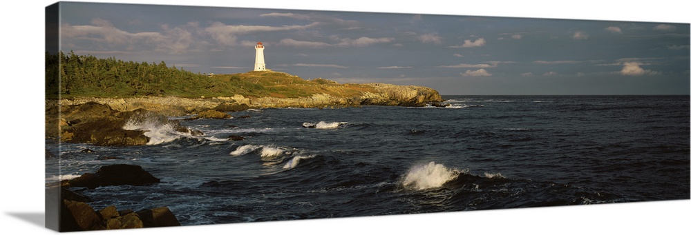 Canada, Nova Scotia, Cape Breton Island, Louisburg lighthouse during sunset
