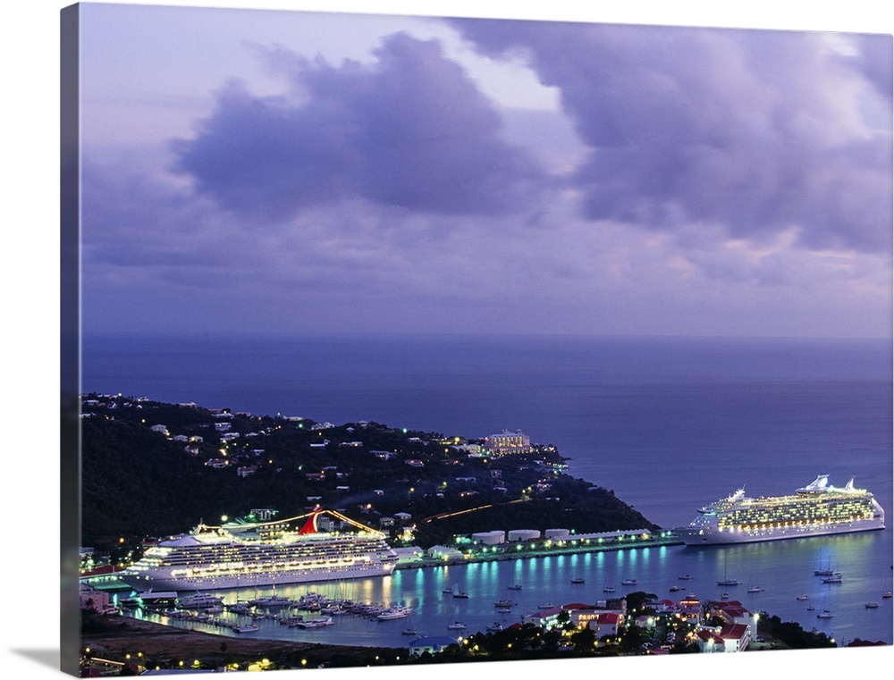 This decorative wall art is a landscape photograph of tourist cruise ships docking in a Caribbean harbor at twilight.