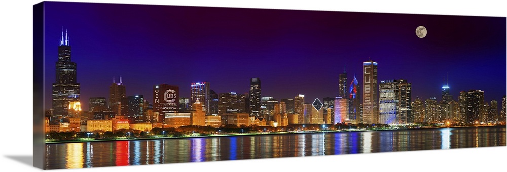 Chicago skyline with Cubs World Series lights night, Moonrise, Lake Michigan, Chicago, Cook County, Illinois, USA.