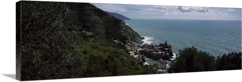 Panoramic image of an Italian cliff leading to a city by the ocean on canvas.