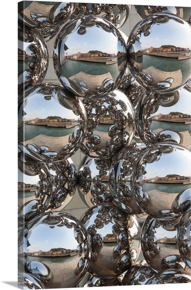 City reflection in chrome spheres, Bilbao, Biscay Province, Basque Country Region, Spain