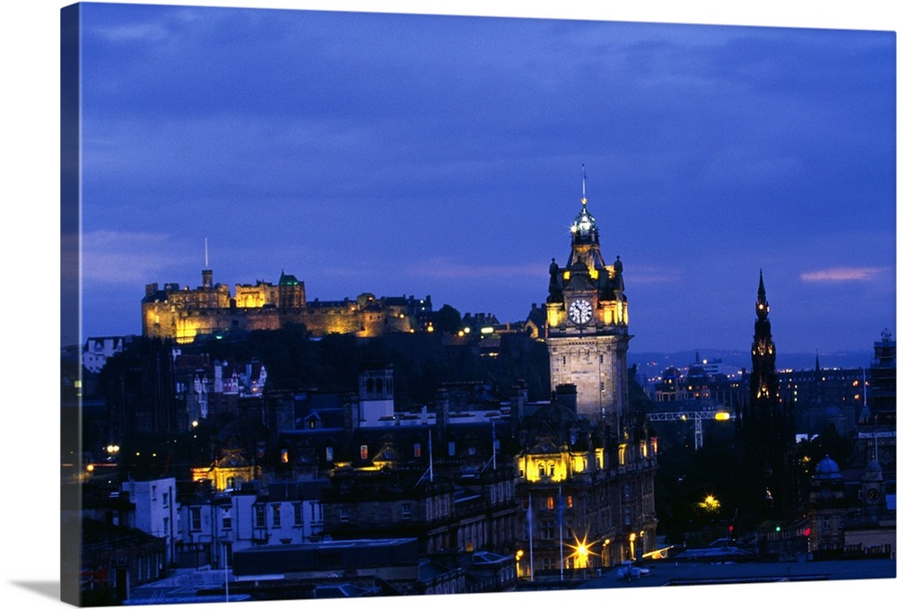 City skyline illuminated at night, Edinburgh, Scotland.