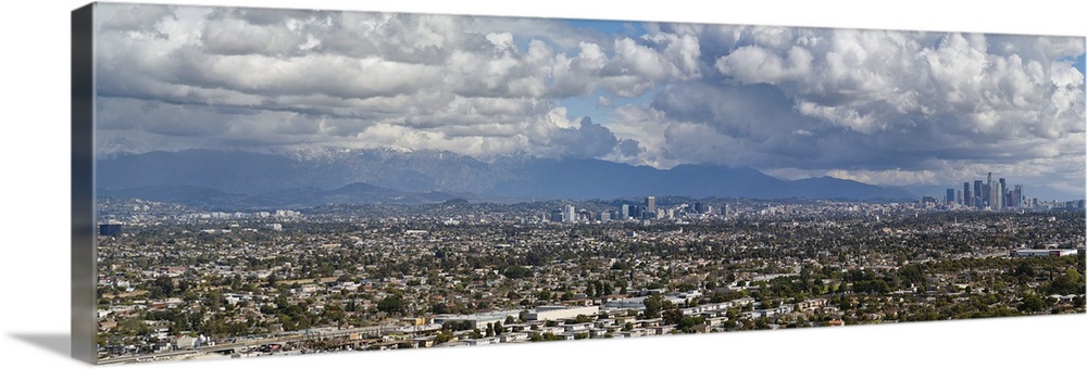 City with mountain range in the background, Mid-Wilshire, Los Angeles, California