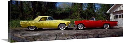 Classic Ford Thunderbird cars on a street