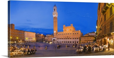 Clock tower with a palace in a city Torre Del Mangia Palazzo Pubblico Piazza Del Campo Siena Tuscany Italy