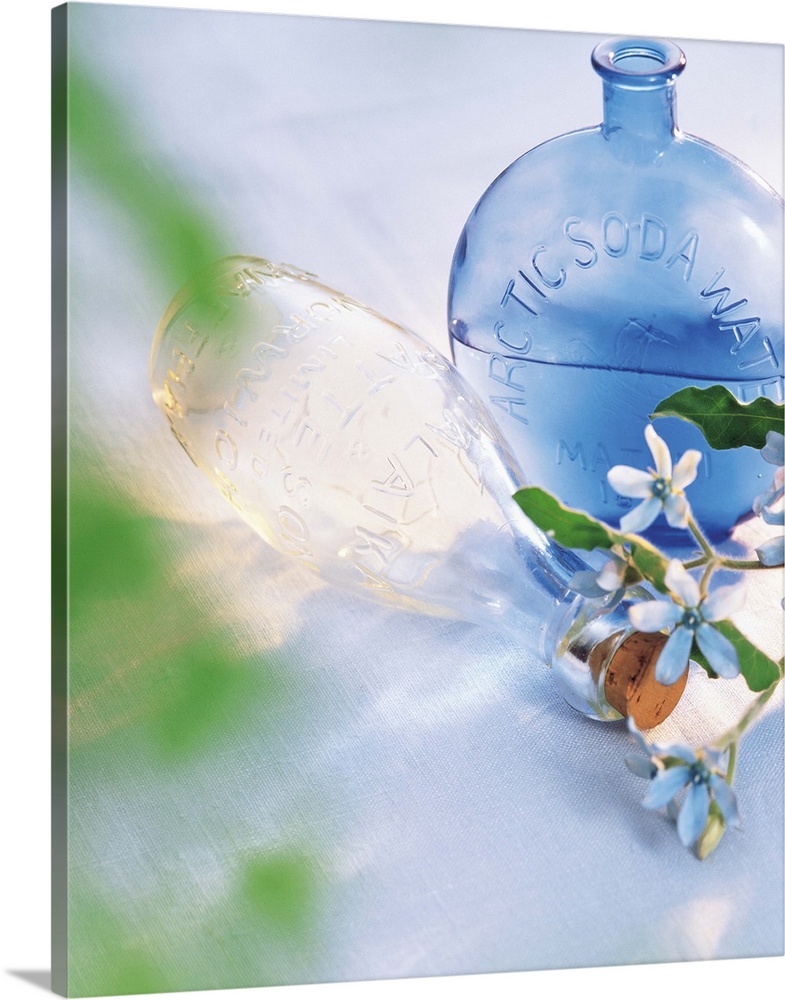 Close View of a Glass Bottle with Flowers