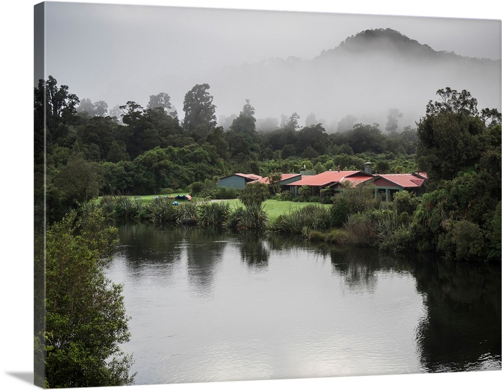 Cottage in park at lakeshore, Te Wahipounamu, Lake Moeraki, West Coast, South Island, New Zealand.