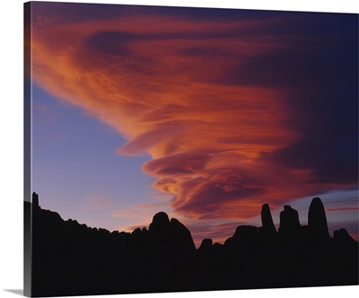Cyclone shaped clouds over rocks, Californian Sierra Nevada, California