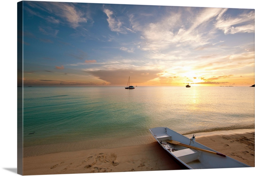 Dinghy boat on beach at sunset, Great Exuma Island, Bahamas