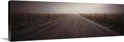 Empty road passing through a landscape, Helena, Montana