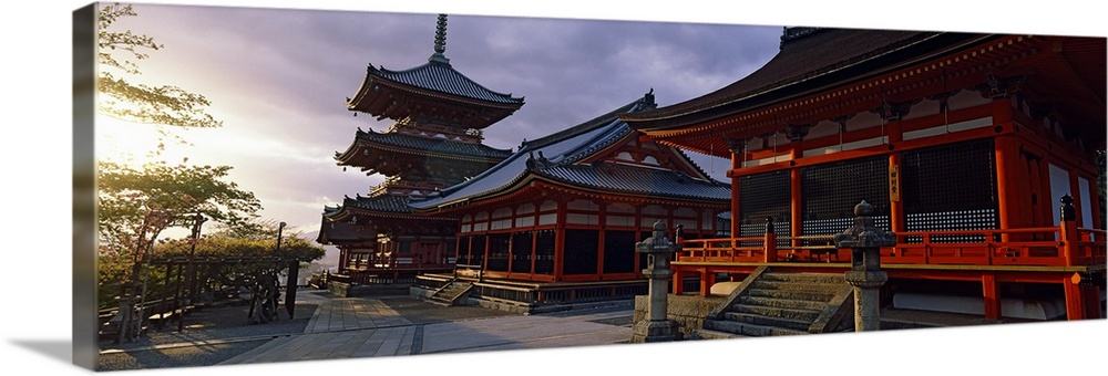Panoramic photograph on a giant canvas of the Kiyomizu-Dera Temple, shadowed as the sun sets in the sky, in the Kyoto Pref...