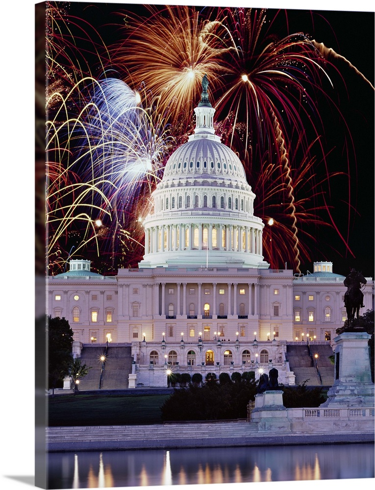 Firework display over a government building at night, Capitol Building, Washington DC