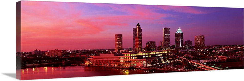 This is a panoramic photograph of the city as the sunsets out of frame.