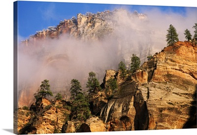 Fog Over Sandstone Cliffs