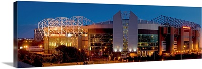 Football stadium lit up at night, Old Trafford, Greater Manchester, England