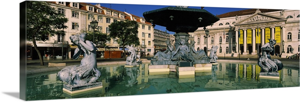 Fountain in front of an opera house, Praca Rossio, National Theatre Dona Maria II, Lisbon, Portugal