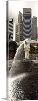 Fountain with office buildings in the background, Merlion Statue, Merlion Park, Singapore River, Singapore