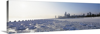Frozen lake with a city in the background, Lake Michigan, Chicago, Illinois