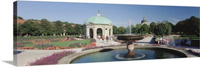 Germany, Munich, Hofgarten, Tourist sitting in the park