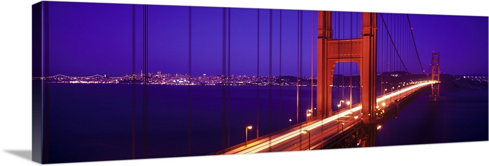 Twilight and red hue of the Golden Gate Bridge in San Francisco, California.