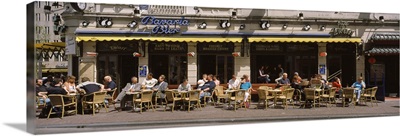 Group of people at a sidewalk cafe, Damstraat, Amsterdam, Netherlands