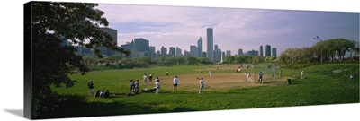Group of people playing baseball in a park, Grant Park, Chicago, Cook County, Illinois