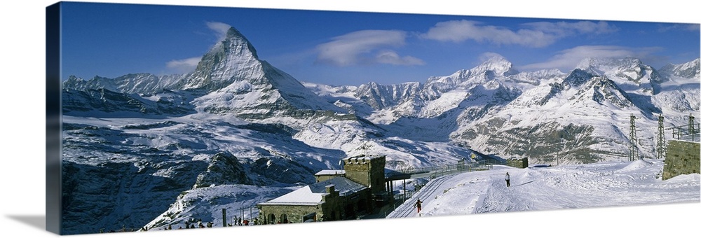 Group of people skiing near a mountain, Matterhorn, Switzerland