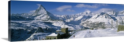 Group of people skiing near a mountain, Matterhorn, Switzerland