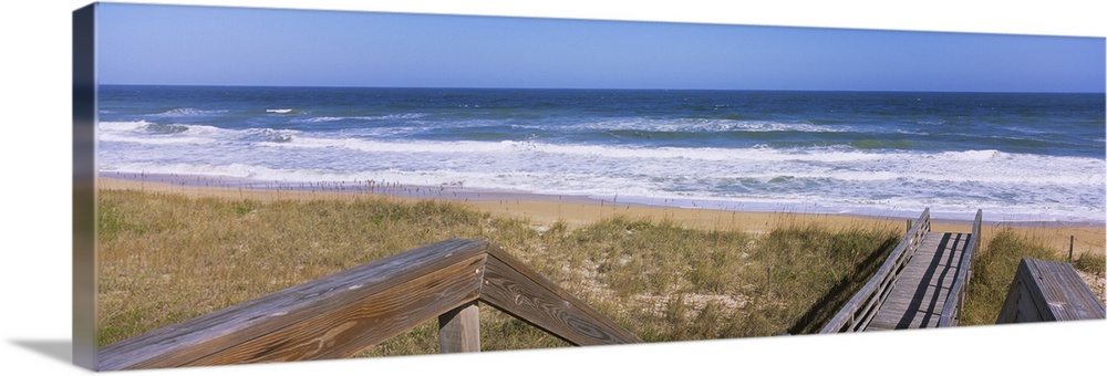High angle view of a boardwalk leading towards a beach, Playlinda Beach, Canaveral National Seashore, Titusville, Florida