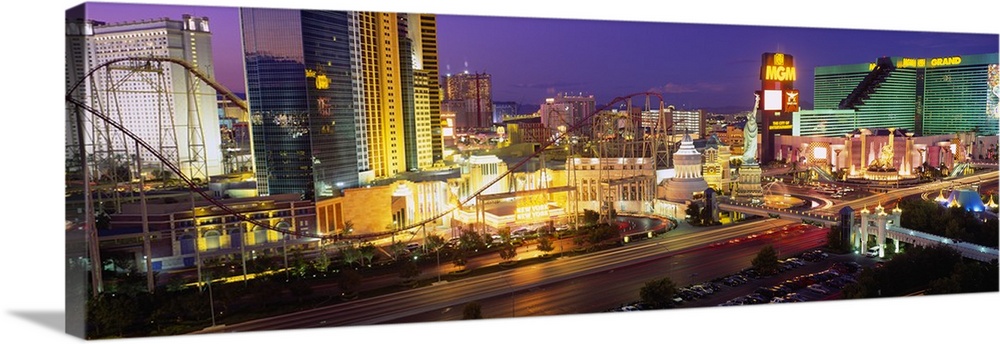 Panoramic photograph on large canvas of the Las Vegas strip, at night, including New York, New York and MGM.