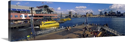 High angle view of a group of people on a pier, Pier 17, South Street Seaport, Manhattan, New York City, New York State