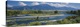 image thumbnail of Big wall panoramic wall docor of a river leading into a bigger body of water and mountains encased in light fog in the bac...