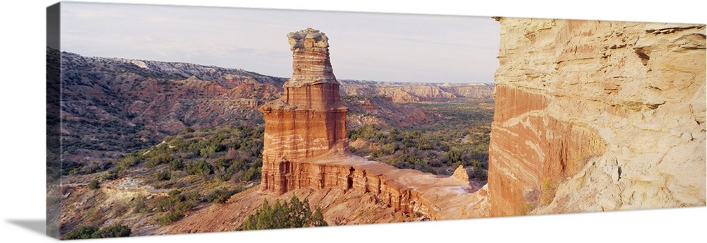 Long photo print of rock formations in the desert in Texas.