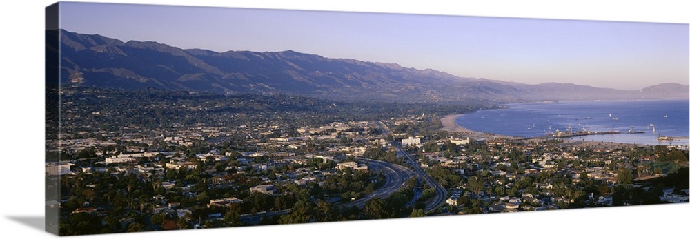 Panoramic photo print of the Pacific Ocean meeting Santa Barbara and the rolling mountains in the distance.