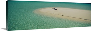 High angle view of a woman sunbathing on the beach, Maldives image thumbnail