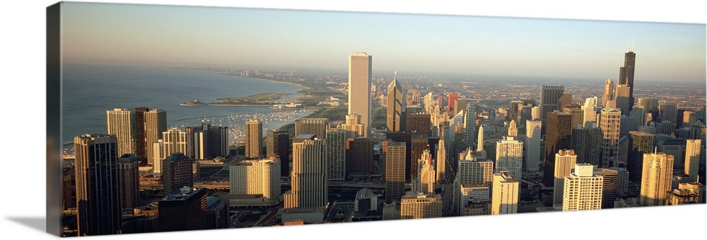 This panoramic canvas is an aerial photograph of the city skyline.